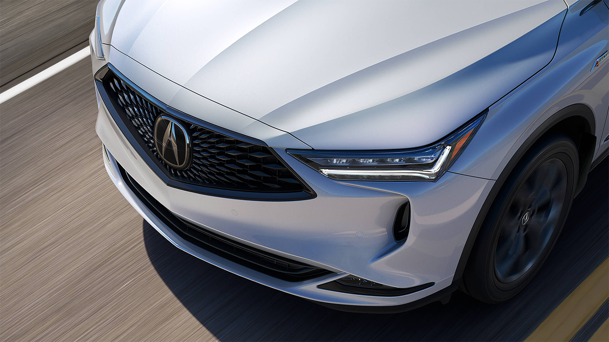 An overhead shot of the hood of a grey MDX.