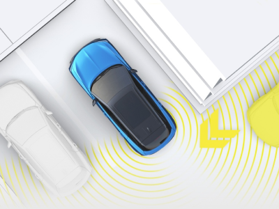 Digital rendering, where everything is white except for the ZDX. Bird’s eye view of blue ZDX reversing out of a parking spot. Yellow sensor lines emitting from the back detect a car passing by. 